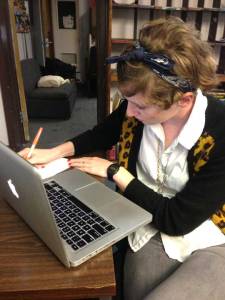 Kathryn Varn transcribes notes for a story at the office of The Alligator. Varn is the police beat reporter this semester.