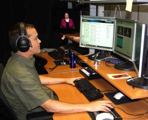 Joe Nicholson checks the audio levels during recordin